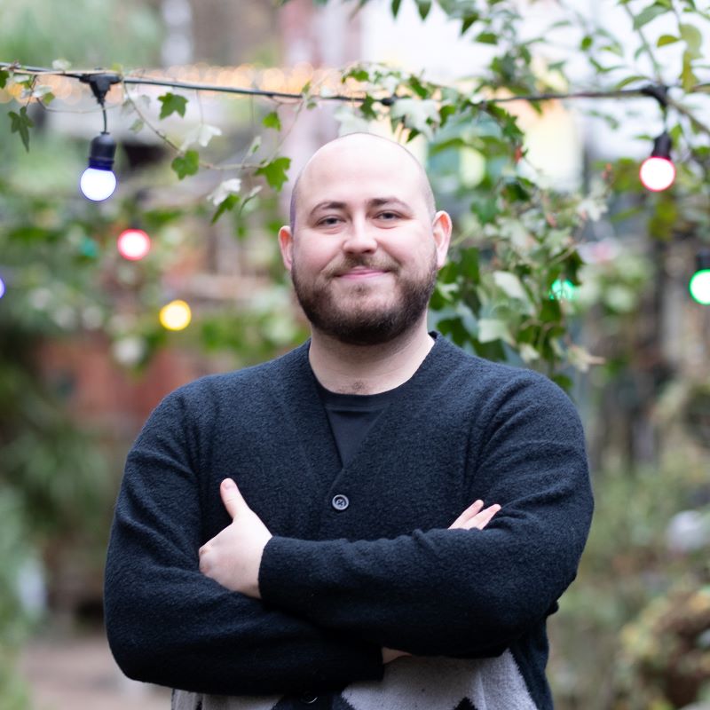 Portrait photograph of Sam Dibley